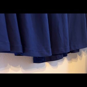 Large below-the-knee, a-line dark blue skirt